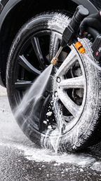 TorqueWash cleaning a car wheel and tire